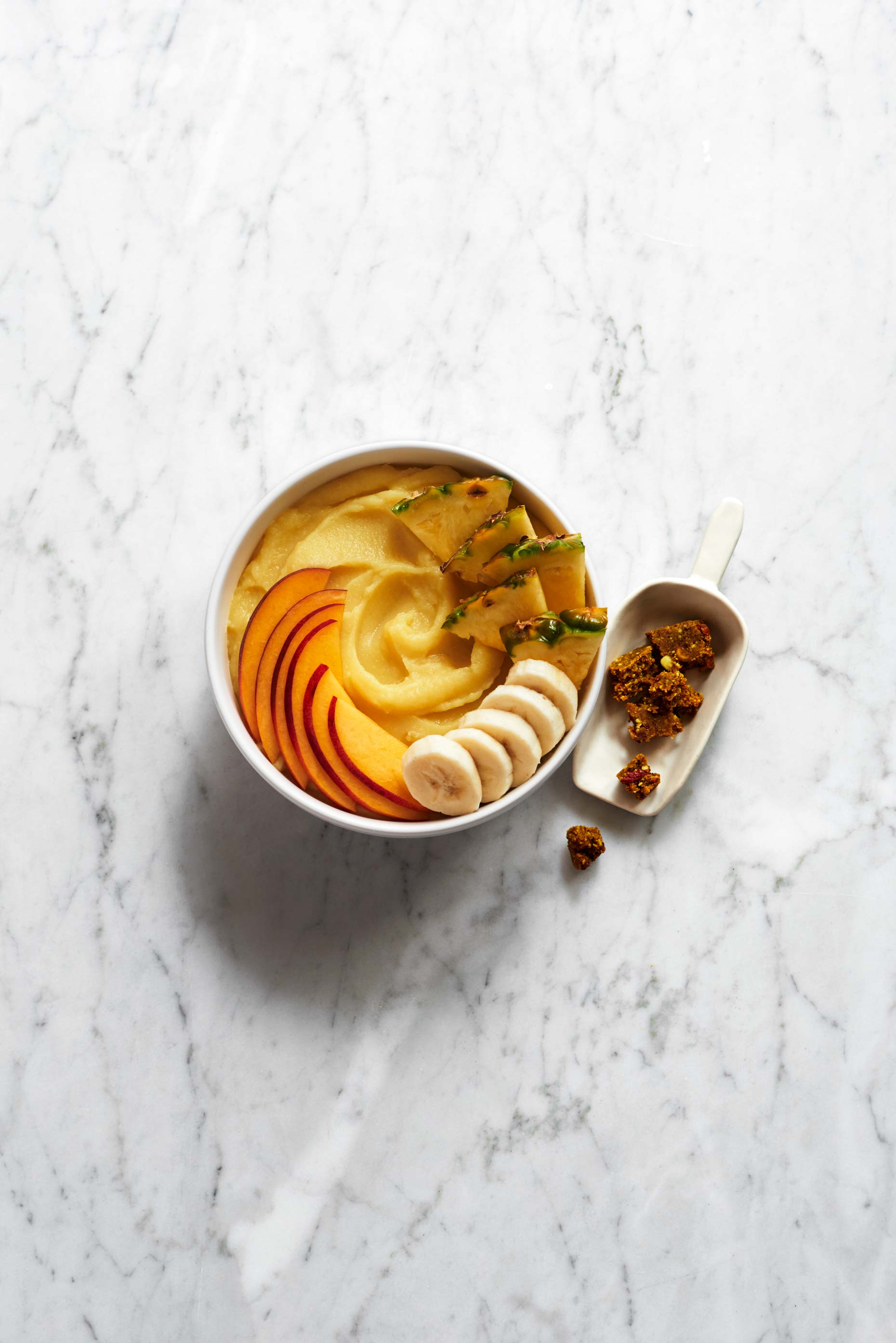 Yellow Ntidote breakfast bowl photographed by Food Photographer Adrian Mueller New York