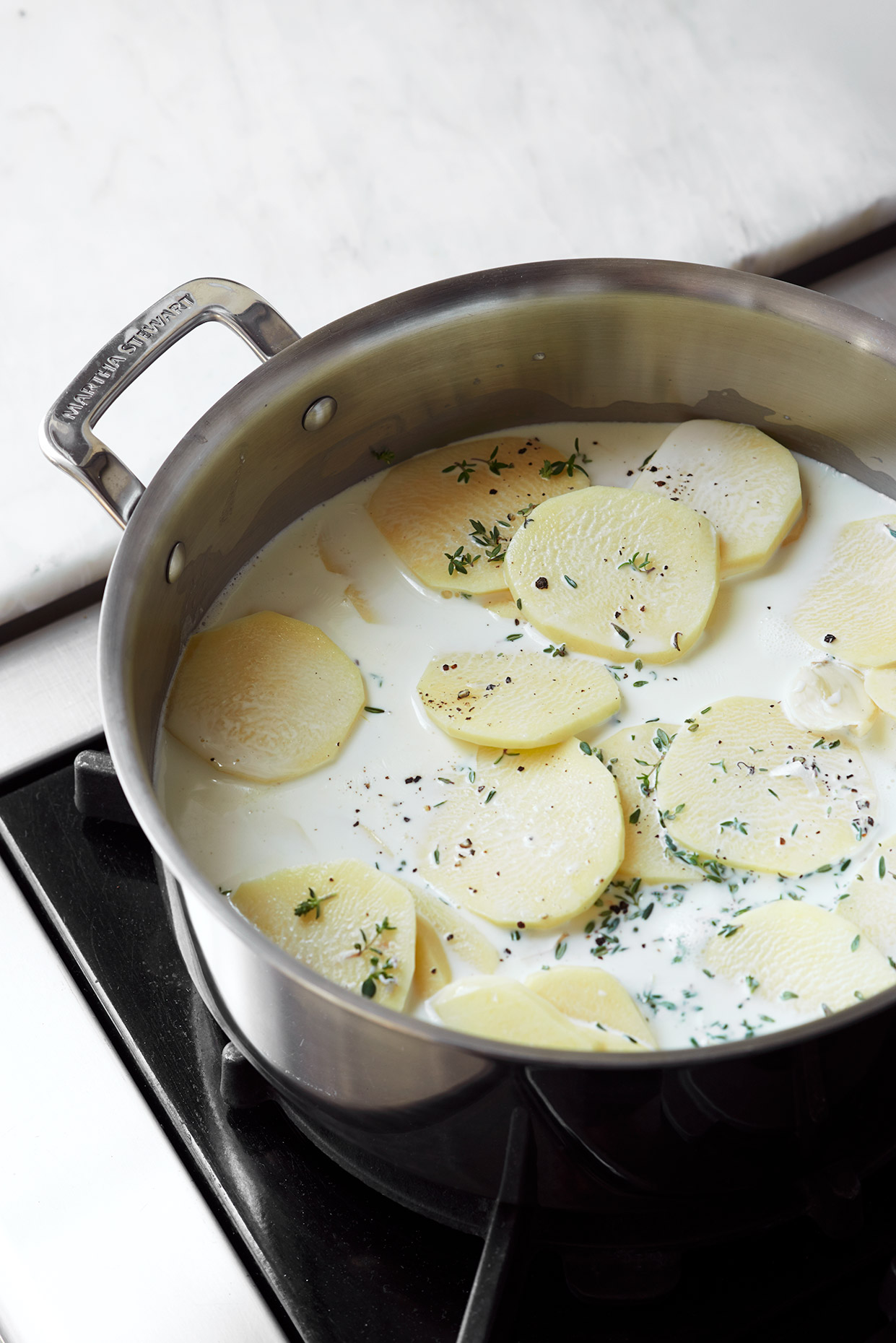 Potatoes-and-Cream-in-Pot-main2-MarthaStewart